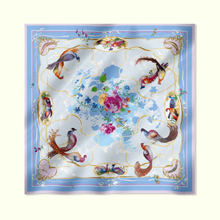 Exquisite Chelsea Lovebirds luxury silk scarf, flat lay showing romantic 18th-century bird motifs and florals on powder blue silk