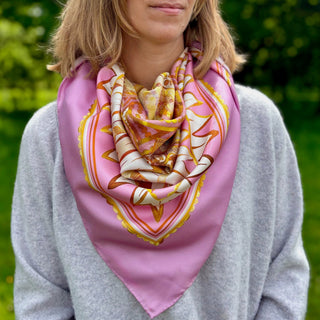 View of model in Derby Pattern 188 silk scarf styled as a loose bandana