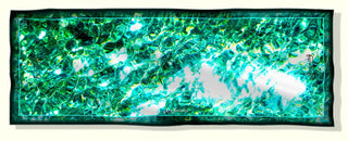 Flat front view of silk scarf with abstract design turquoise and green hues, reminiscent of an underwater shimmering, wave-like texture, light-colored border with dark edges.