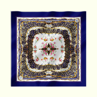     Full flat lay of The Northumbria Silk Scarf by Anna Acciarini, featuring a porcelain-inspired pattern in deep blue and gold.