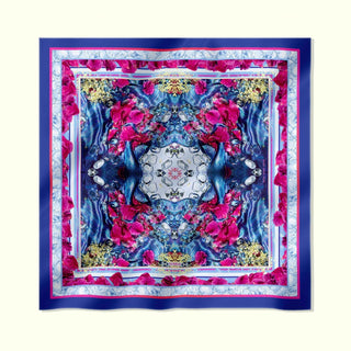 Flat lay of the Royal Peony Crush Silk Scarf, showing full floral and crystal pattern in deep cerulean, magenta, and gold.